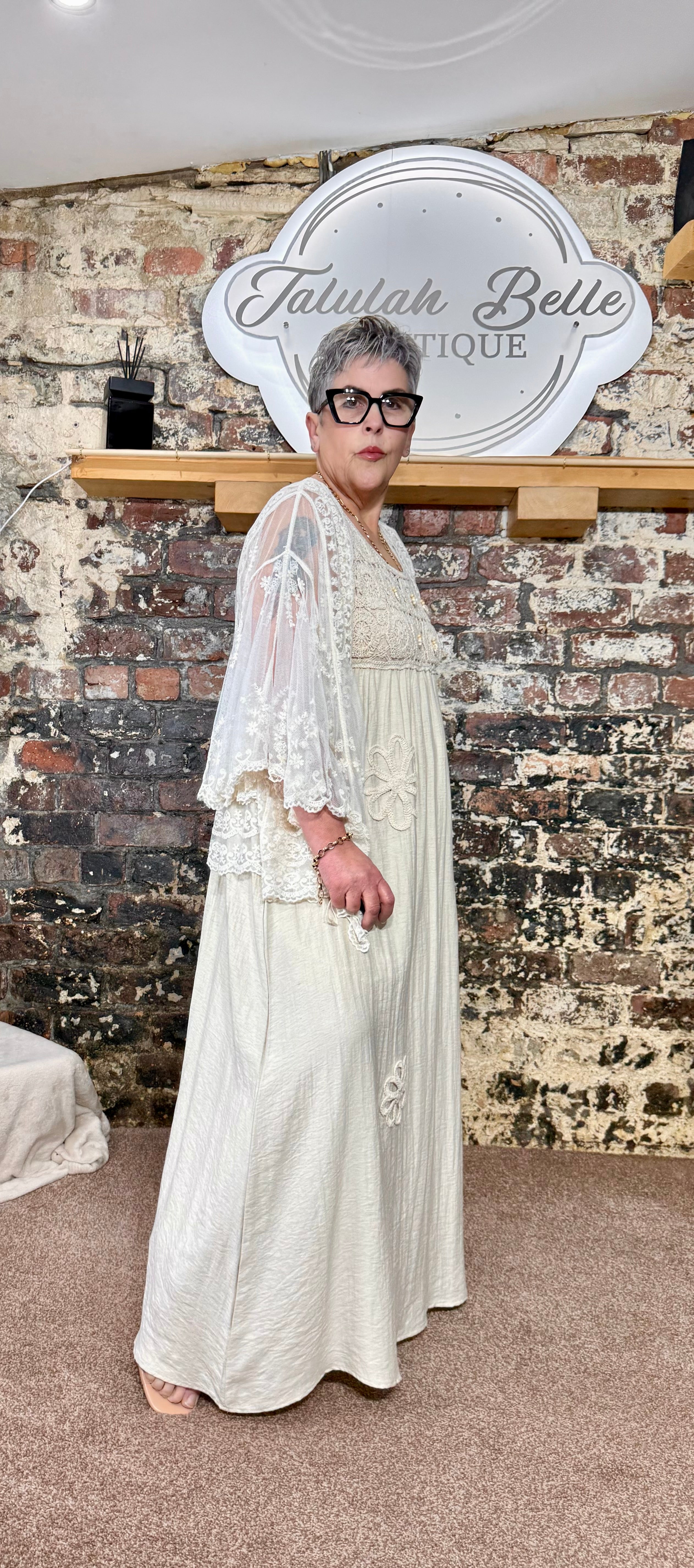 Linen blend dress with floral rope appliqués & crochet bust
