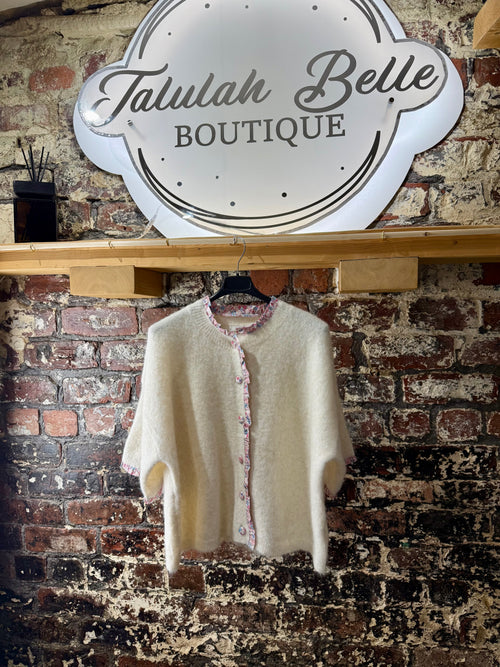 Cardigan with inspired fabric trimmed buttons & delicate edges