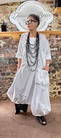 Quirky poplin cotton dress with oversized patch pocket.