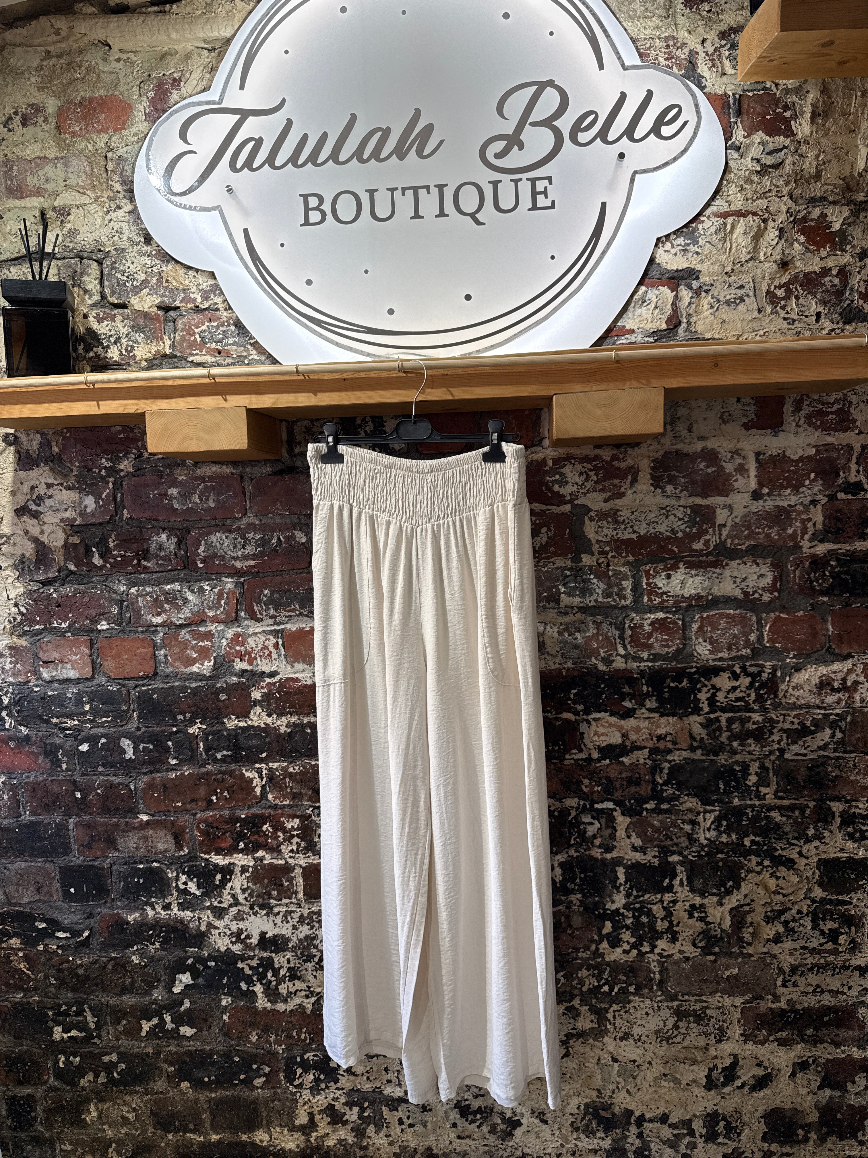 Wide leg shirring waist trousers