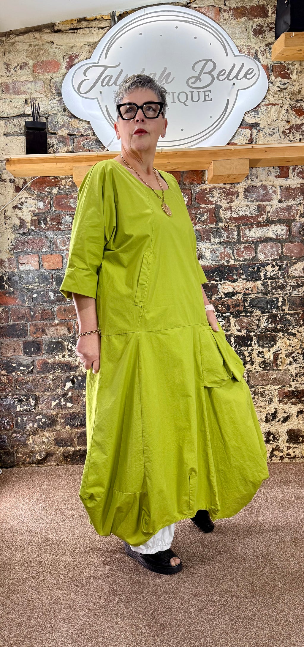 Quirky poplin cotton dress with oversized patch pocket.