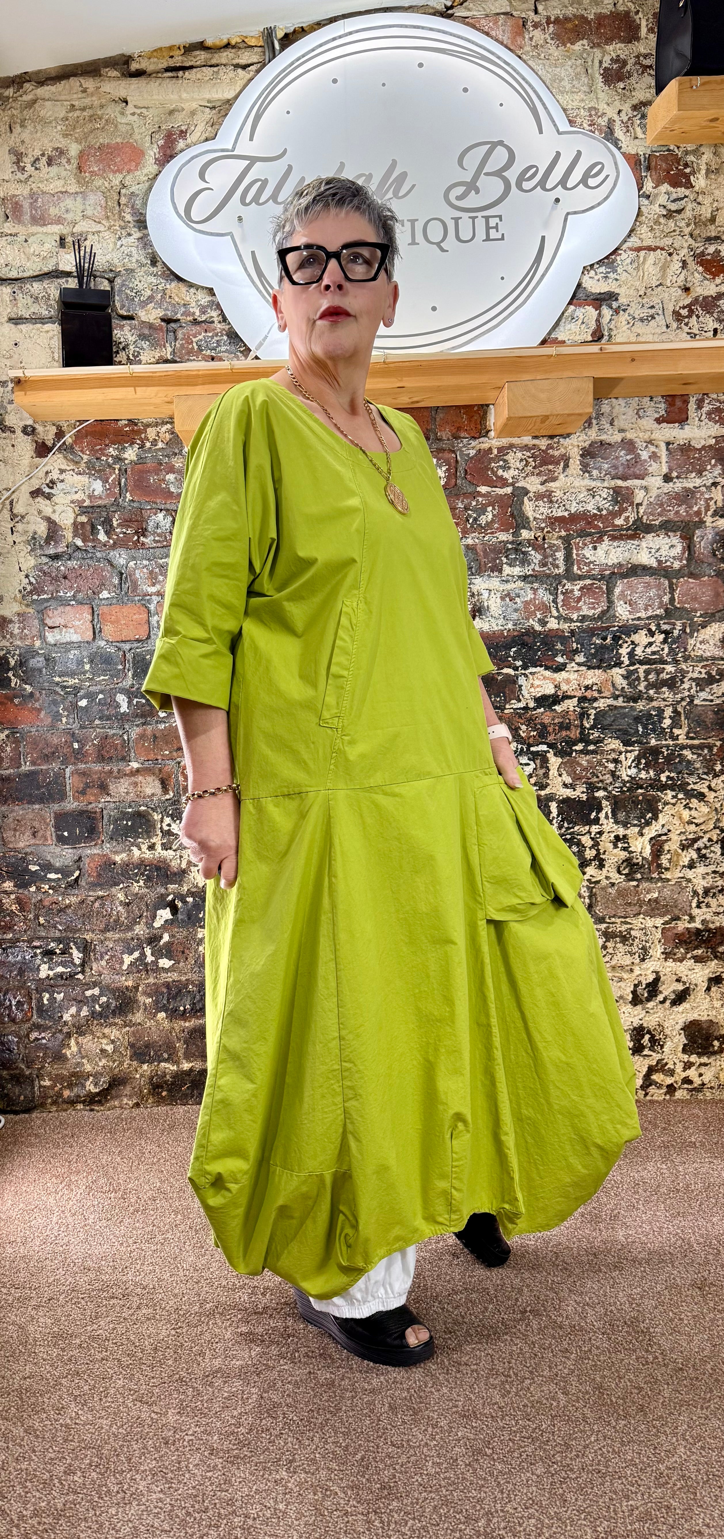 Quirky poplin cotton dress with oversized patch pocket.