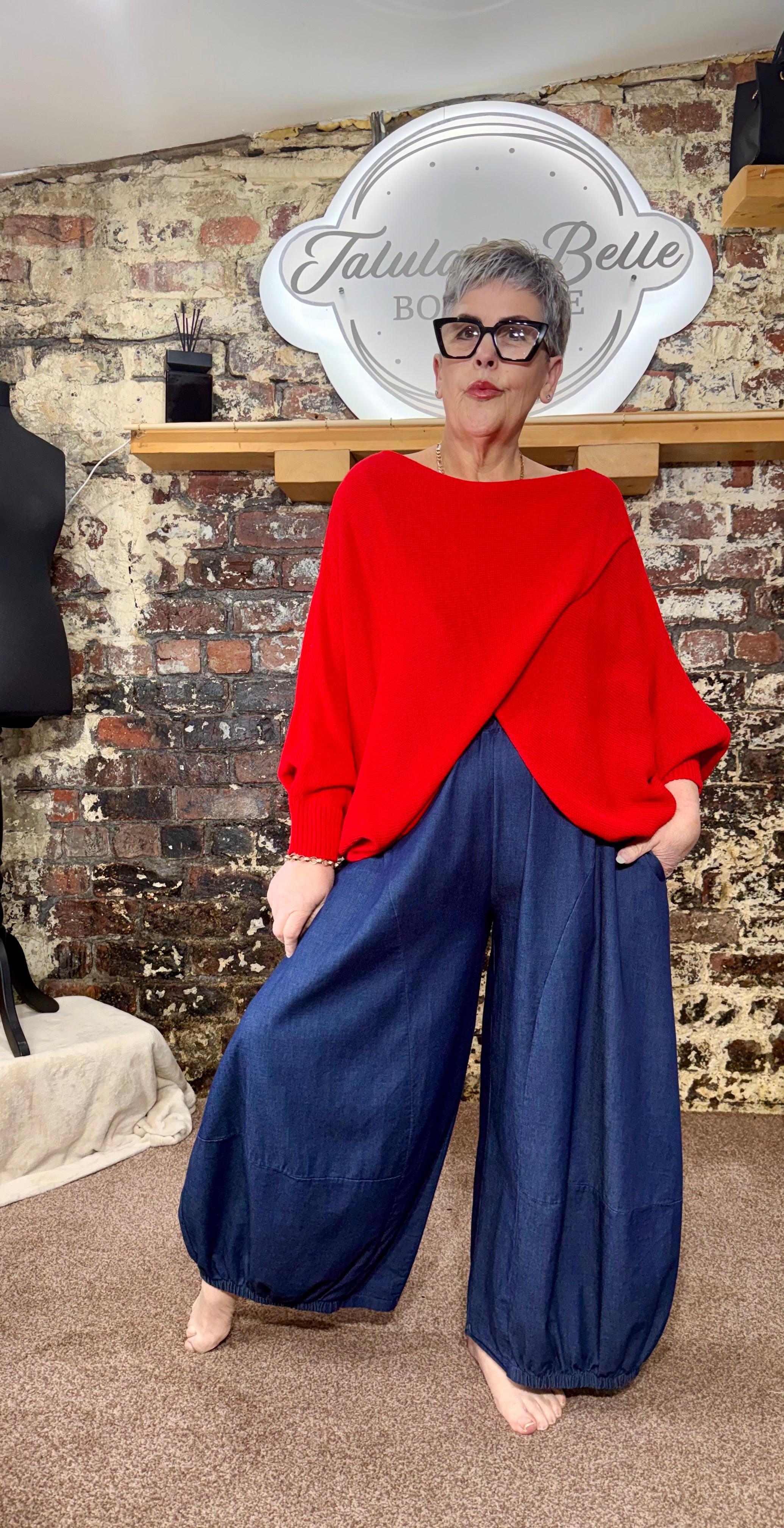 Summer weight longer length crossover knit.