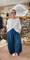 Summer weight longer length crossover knit.